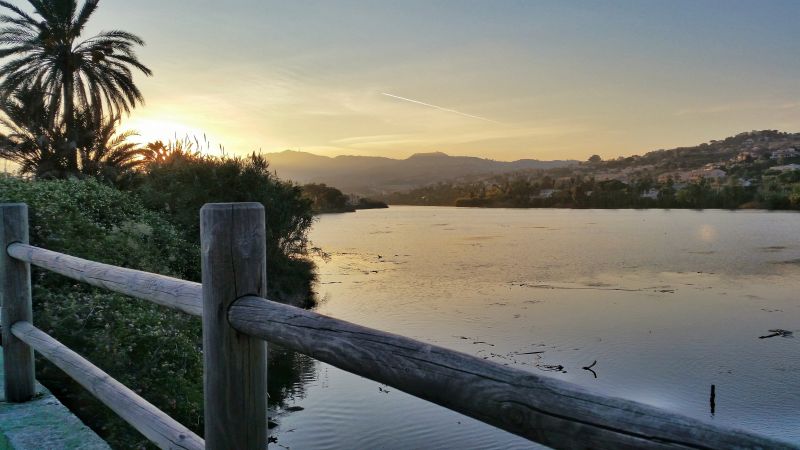 Fence Installation at Sunset